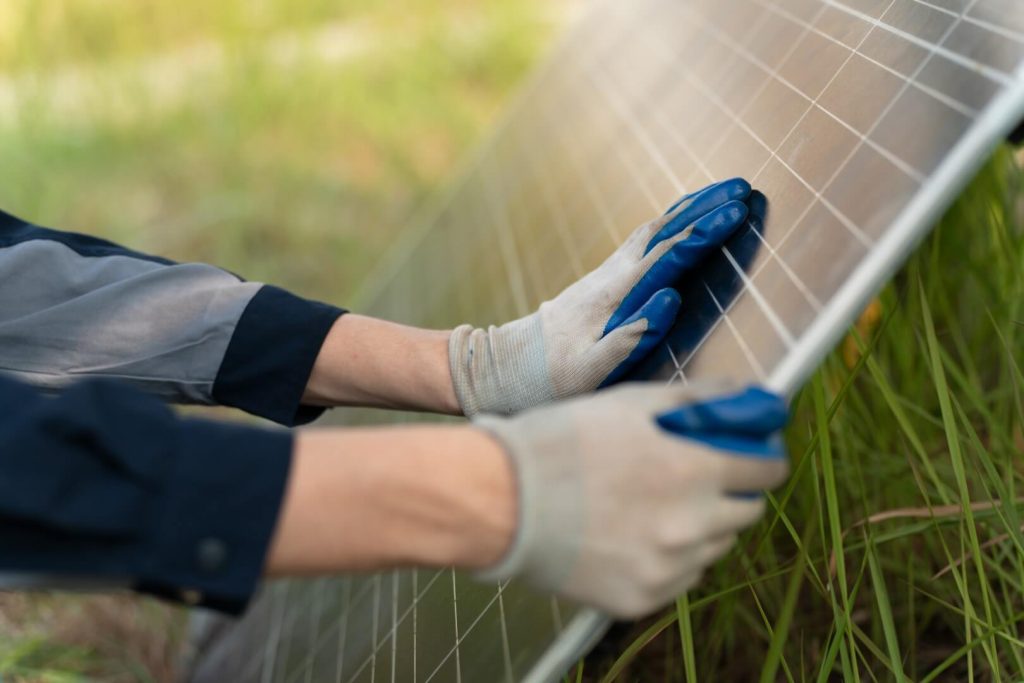 construction-site-engineer-servicing-solar-panel